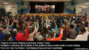 Photo of Theatre of Peace student facilitator connecting with students in the audience about social media and cyber-bullying. Part of Act Like You Matter: Anti-Bullying Empowerment Workshops and Assemblies.