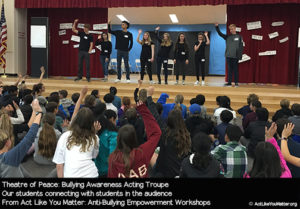 Photo of Theatre of Peace students connecting with students in the audience. From Act Like You Matter: Anti-Bullying Empowerment Workshops.