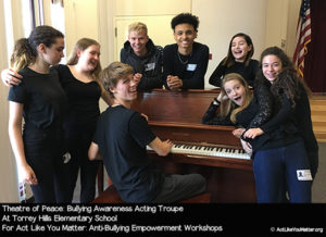 Photo of Theatre of Peace on lunch break and at the piano. From Act Like You Matter: Anti-Bullying Empowerment Workshops.