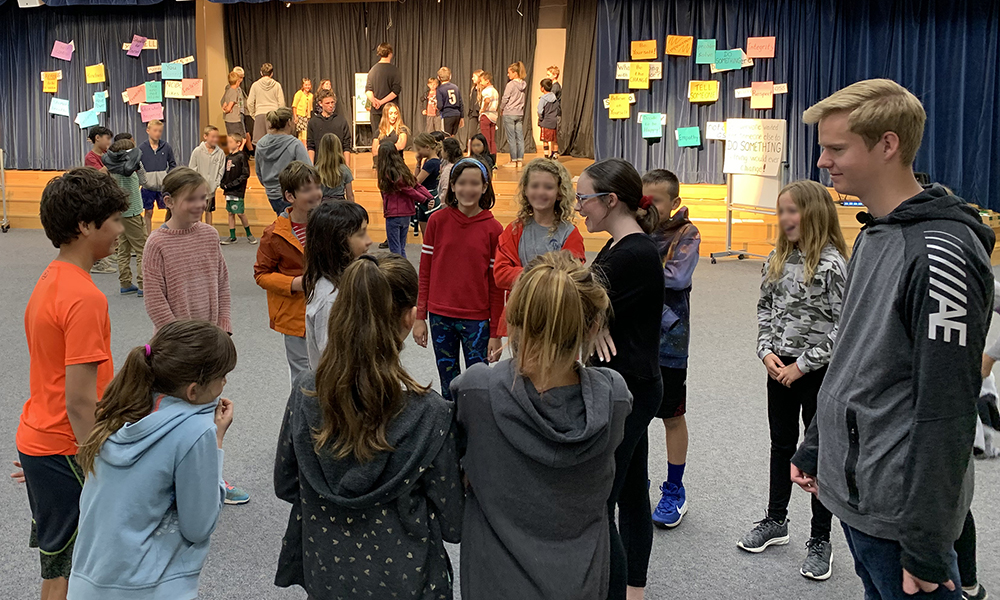Photo of Theatre of Peace: Youth Anti-Bullying Acting Troupe running community building activities as part of "Act Like You Matter: Anti-Bullying Empowerment Workshops for Older Elementary." anti-bullying workshops for 4th-6th grades in San Diego