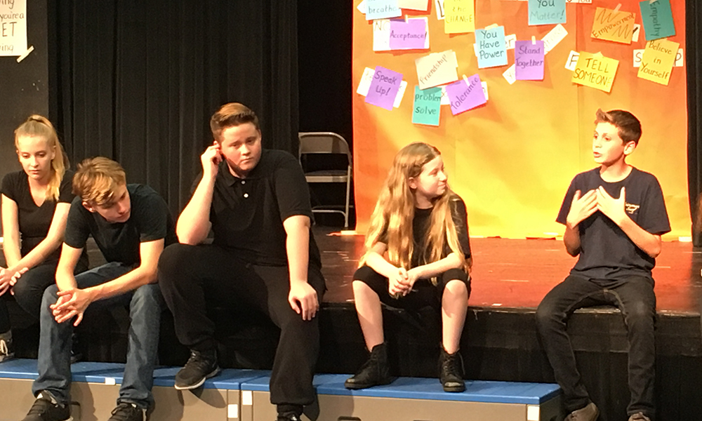 Photo of Theatre of Peace: Youth Anti-Bullying Acting Troupe answering students questions as part of "Act Like You Matter: Anti-Bullying Empowerment Assemblies and Workshops." anti-bullying workshops for 4th-6th grades in San Diego