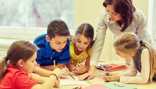 Teacher with Classroom Reading License reading script with older students